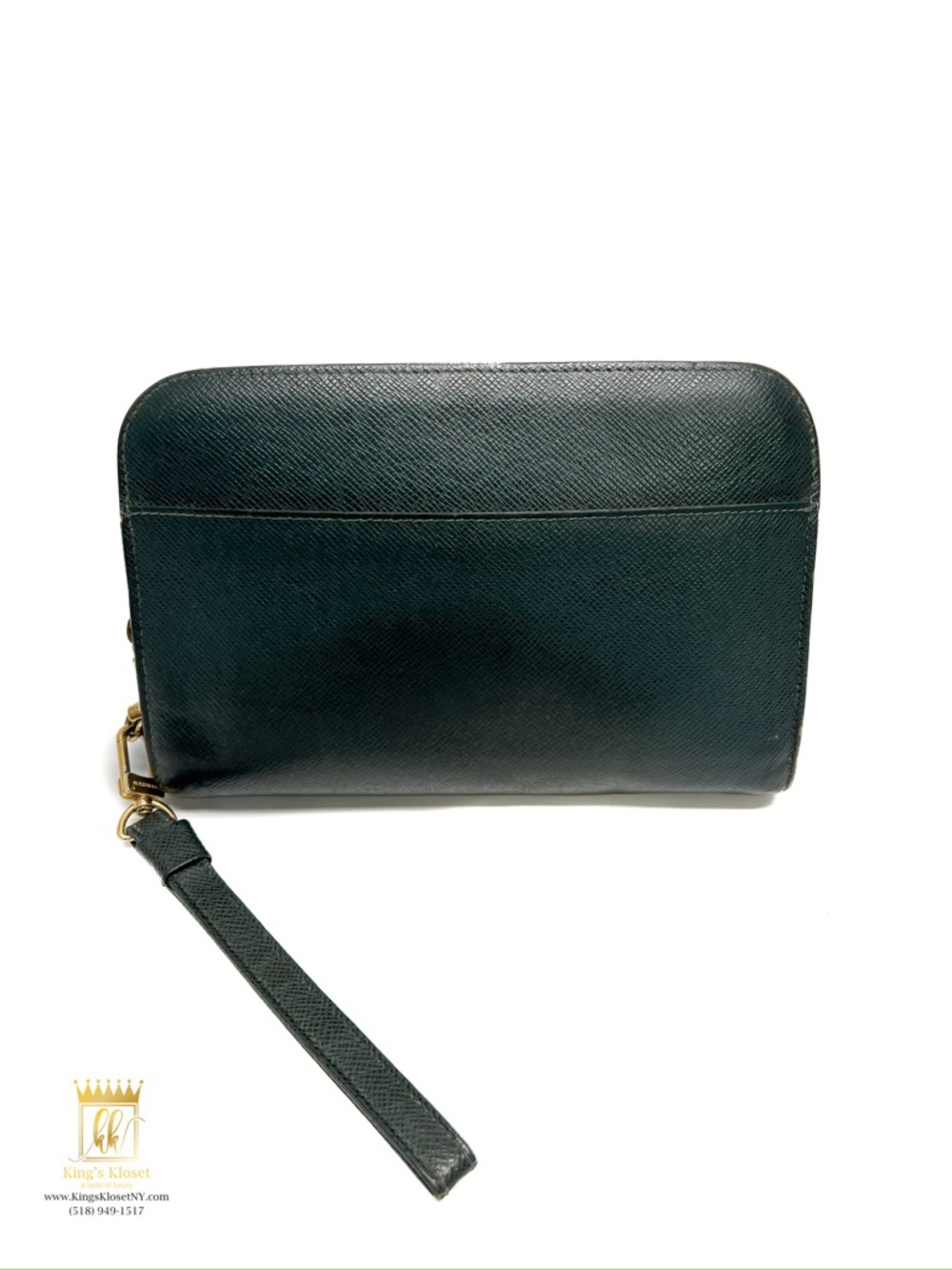 Louis Vuitton Tiaga leather clutch